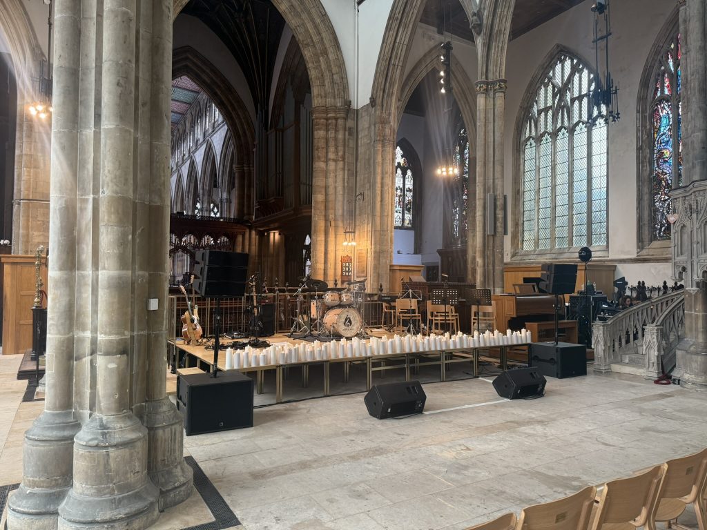A stage setup for a concert in a cathedral. 